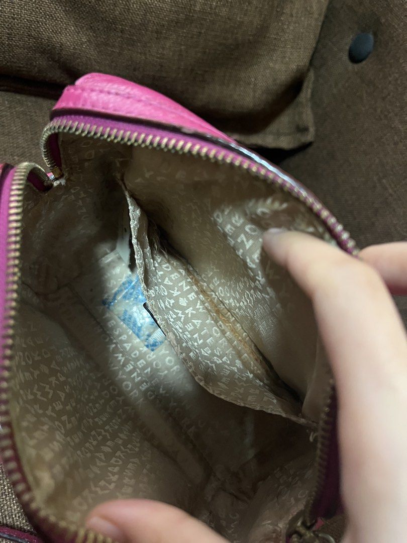 KATE SPADE BAG (Category: Luxury Bags & Wallets) located in Quezon City. Submitted by mscrybabyyy (Listing ID 1456482417, Image 3). Description: This is a Kate Spade New York crossbody bag (Perry Lane LooLoo) Type: Small crossbody / shoulder bag, made of pebbled leather with cut-out/perforated detailing. Color: Bright pink / peony pink. Features: long strap, front zip pocket, main top zip, and signature Kate Spade logo plaque. Style: Compact, eve