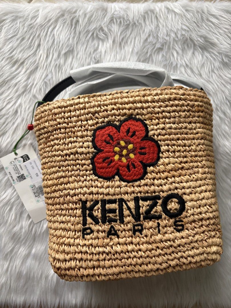 Kenzo Raffia Bag (Category: Luxury Bags & Wallets) located in Quezon City. Submitted by kaaat15 (Listing ID 1456560303, Image 1). Description: With dust bag.