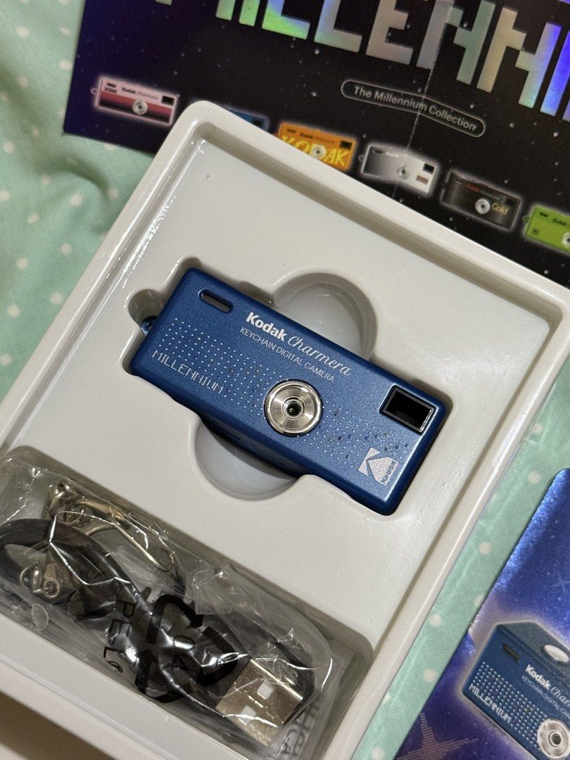 Kodak Charmera Keychain Digital Camera - Picture the Millennium (Category: Cameras) located in Quezon City. Submitted by StylePoise (Listing ID 1456565921, Image 2). Description: - Kodak Charmera keychain digital camera - Part of the exclusive Millennium Collection - Includes original packaging - Comes with USB cable and keychain strap - Compact and highly portable design - Ideal for novelty use or collectors.