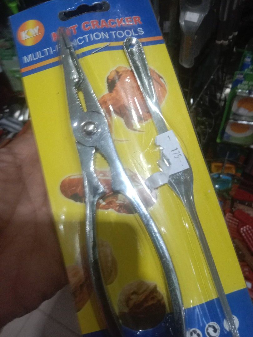 KW Nut Cracker Multi-Function Tools Set (Category: Craft Supplies & Tools) located in Tawau. Submitted by nellydali (Listing ID 1456489020, Image 1). Description: - KW Brand Nut Cracker & Multi-Function Tool - Perfect for cracking nuts and seafood - Comes with a handy fork for extracting meat - Made from durable metal for long-lasting use - An essential gadget for any kitchen.