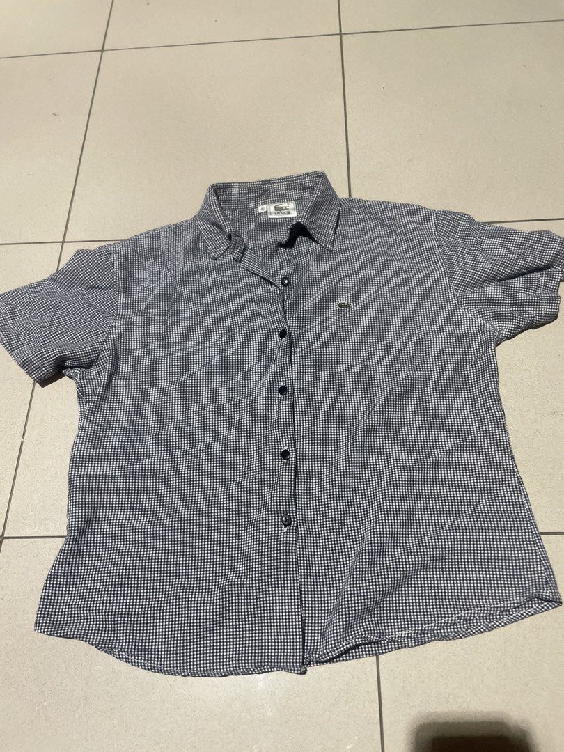 Lacoste Gingham Button Down Shirt (Category: Others Tops) located in Manila. Submitted by sapsari (Listing ID 1456518527, Image 1). Description: - Classic Lacoste button-down shirt - Black and white gingham pattern - size 42 on tag but best fit small to medium - complete button. -may small stain but washable naman.