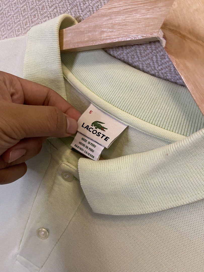 Lacoste polo shirt (Category: Tshirts & Polo Shirts ) located in Manila. Submitted by hypestock_mnl (Listing ID 1456455096, Image 3). Description: Need repair on side.