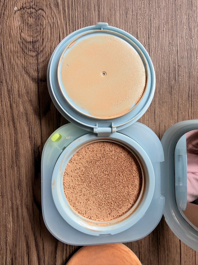 LANEIGE Cushion Foundation Compact with Puff and Refill (Category: Makeup) located in Manila. Submitted by starapple24_ (Listing ID 1456439298, Image 3). Description: - Light blue LANEIGE cushion foundation compact - Includes original puff and refill - Built-in mirror inside the compact - Cushion has some product remaining - Puff shows light staining - Sold as is Shade 23N, neutral sand RFS: not my shade (too light on me) 💔 open to exchanges for
