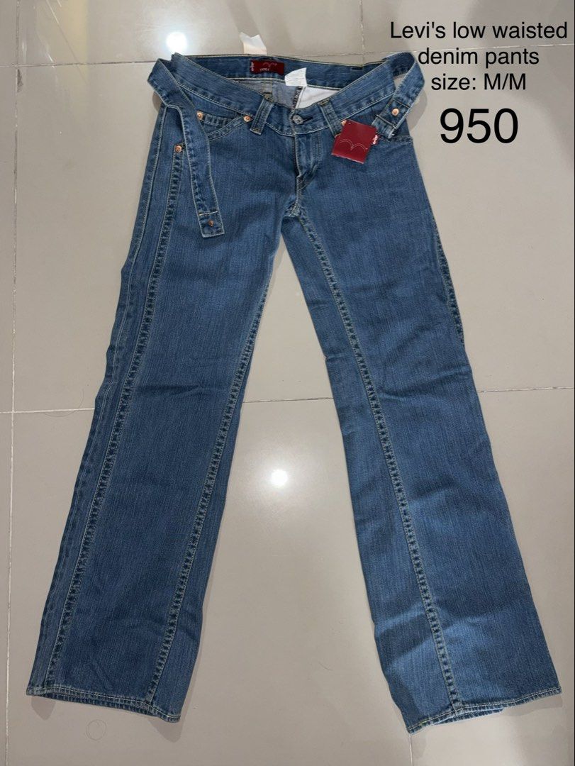 Levi's Low Waisted Denim Pants M/M (Category: Jeans) located in Quezon City. Submitted by gempurinz (Listing ID 1456566300, Image 1). Description: - Levi's low-waisted denim pants - Size: Medium (M) - Classic blue wash - Features belt loops and a matching belt - Flare leg style - Ideal for casual wear.