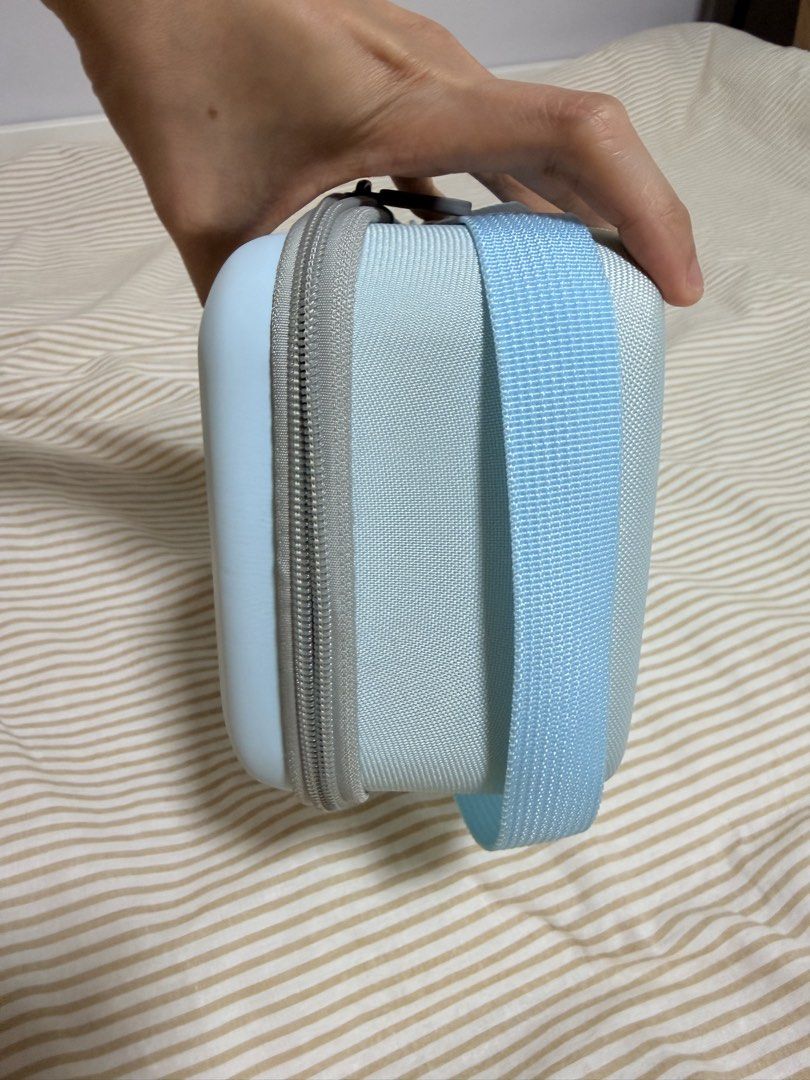 Light Blue Nintendo Switch 2 Carrying Case (Category: Cases & Covers) located in Quezon City. Submitted by arakin (Listing ID 1456526056, Image 3). Description: - Light blue carrying case for Nintendo Switch 2 - Secure zipper closure - Side strap for easy carrying - Ample space for Switch 2 console and essential accessories - Bought for Php 900 - RFS: Bought a new carrying case.