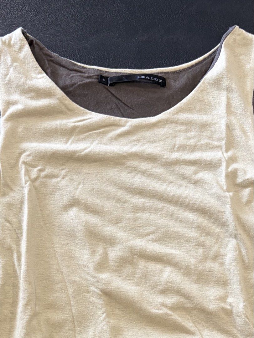 Loalde Green Layered Sleeveless Trapeze Top (Category: Blouses) located in Quezon City. Submitted by ciyellow (Listing ID 1456479657, Image 1). Description: Loalde Green 2 tone layered Sleeveless Trapeze top.