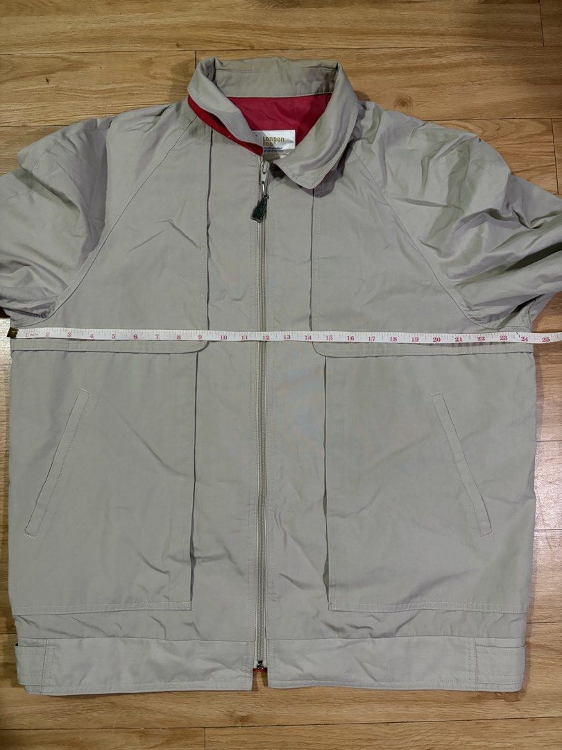 London Fog Beige Harrington Jacket (Category: Coats, Jackets and Outerwear) located in Paranaque City. Submitted by uw4kk (Listing ID 1456556574, Image 3). Description: - Missing clip and it has a minor flaw on the neck - Classic London Fog jacket - Beige color with red lining - Zip-up front - Two front pockets - Size: 44 REG - Made in Taiwan - Ideal for cooler weather.
