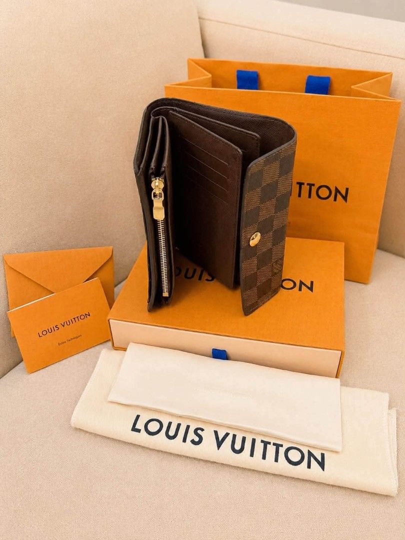 Louis Vuitton Damier Azur Small Wallet (Category: Luxury Bags & Wallets) located in Davao. Submitted by gretchenal19856 (Listing ID 1456474749, Image 2). Description: - Authentic Louis Vuitton wallet in Damier Azur canvas - Secure snap button closure - Convenient zipped coin compartment - Ample card slots for organization - Comes with original box, dust bag, and shopping bag - Ideal for everyday essentials.