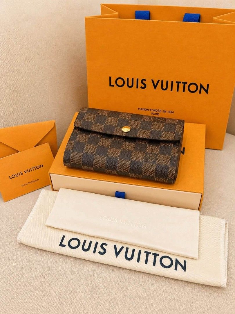 Louis Vuitton Damier Azur Small Wallet (Category: Luxury Bags & Wallets) located in Davao. Submitted by gretchenal19856 (Listing ID 1456474749, Image 1). Description: - Authentic Louis Vuitton wallet in Damier Azur canvas - Secure snap button closure - Convenient zipped coin compartment - Ample card slots for organization - Comes with original box, dust bag, and shopping bag - Ideal for everyday essentials.