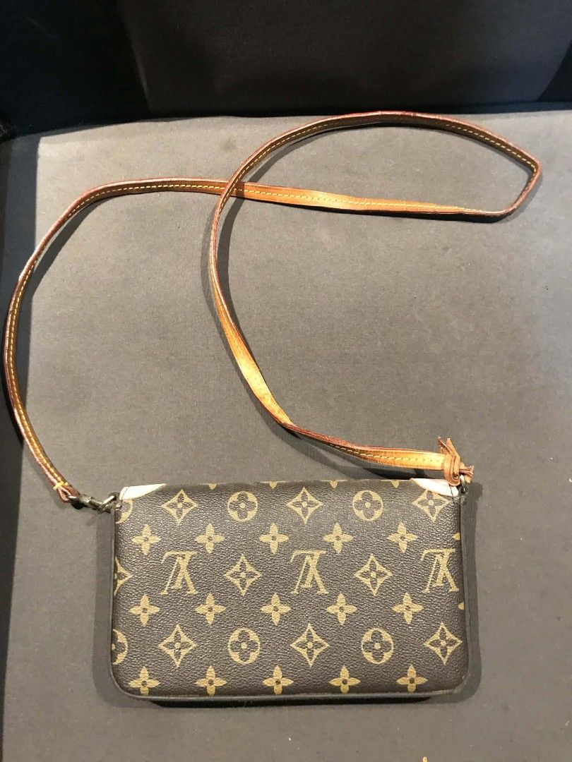 Louis Vuitton Monogram Mini Pochette Accessoire Piggy Face (Category: Luxury Bags & Wallets) located in Midsayap. Submitted by purse_gedo (Listing ID 1456599026, Image 2). Description: - Cute Louis Vuitton crossbody bag - Monogram canvas with playful piggy face design - Pink interior - Adjustable leather strap - Ideal for essentials - Shows some wear on strap and corners - Perfect for a fun, playful look.