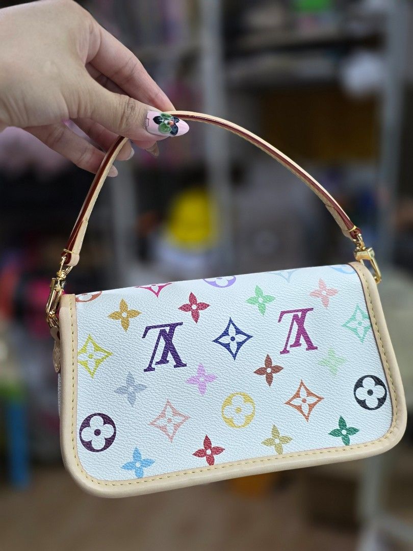 LV Multicolor Pochette Sling bag (Category: Luxury Bags & Wallets) located in Antipolo. Submitted by aaliyahs.closet2 (Listing ID 1456433104, Image 3). Description: ALL MUST GO. DECLUTTERING MY PERSONAL BAGS. Self-Authentication. Strictly 2days Reservation Only. Location: Antipolo, City Shipment via: Lalamove LBC Cash on delivery J&T Meet- ups is available for higher amount only. Disclaimer: I am not affliated with any of the brands featured in t