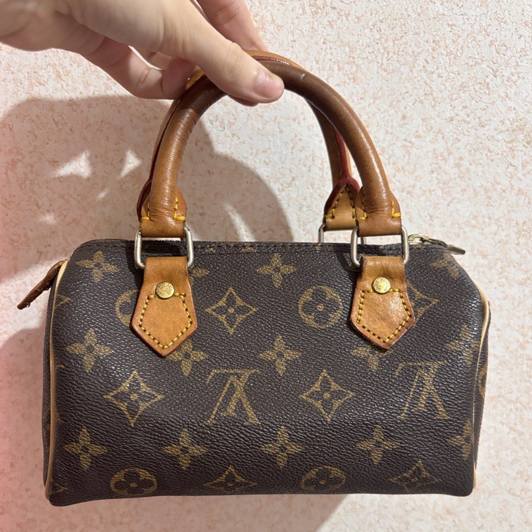 LV vintage nano speedy (Category: Luxury Bags & Wallets) located in Las Pinas. Submitted by totesarchive (Listing ID 1456563964, Image 1). Description: authentic mini hl speedy - vintage nano speedy - plain brown canvas on the inside, no code (old lv bags features no code) - piping was replaced - oxidized handles/ vachetta leather .
