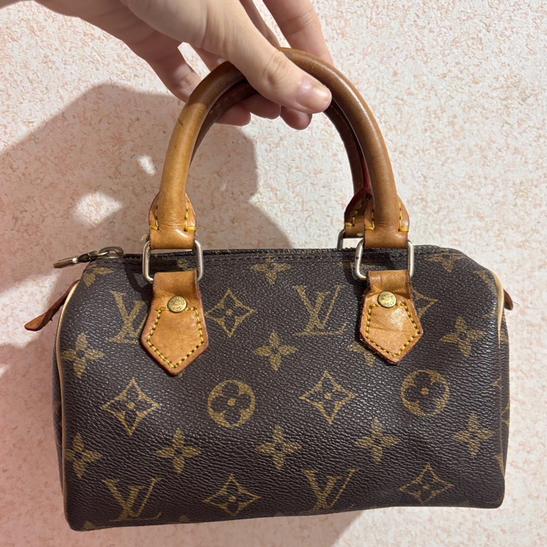 LV vintage nano speedy (Category: Luxury Bags & Wallets) located in Las Pinas. Submitted by totesarchive (Listing ID 1456563964, Image 2). Description: authentic mini hl speedy - vintage nano speedy - plain brown canvas on the inside, no code (old lv bags features no code) - piping was replaced - oxidized handles/ vachetta leather .