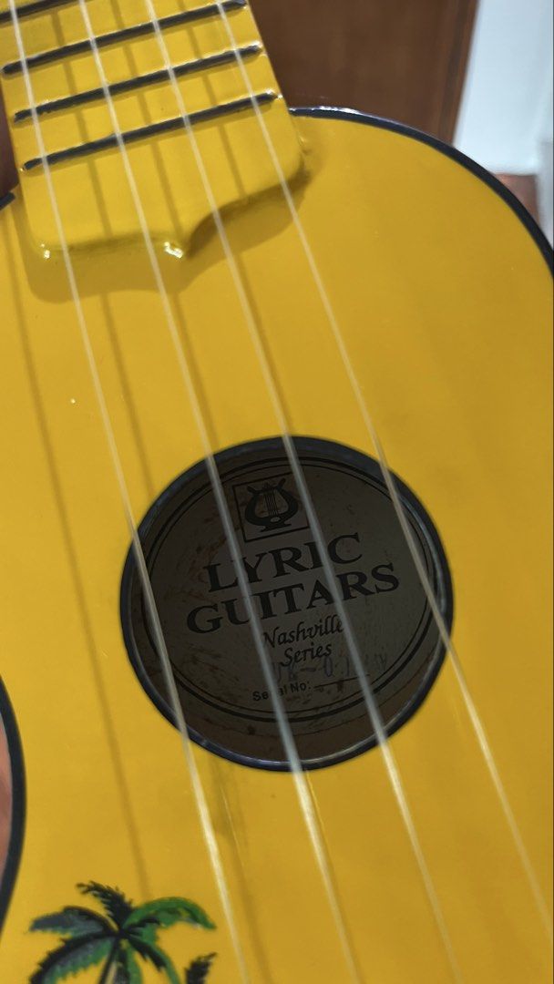 Lyric Ukulele Beach Yellow (comes w/ bag) (Category: Musical Instruments) located in Pasig City. Submitted by beabimbop (Listing ID 1456538101, Image 3). Description: • original lyric brand nashville series. comes with ukulele bag • functional but selling low bc may crack na siya, need string replacement + tuning (check pics‼️) • can be used for decor • for delivery: strictly meet up or pick up only (pasig / metro manila area) tags: uke, ukulele,