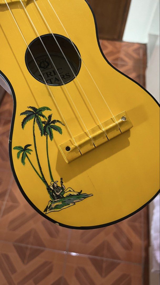 Lyric Ukulele Beach Yellow (comes w/ bag) (Category: Musical Instruments) located in Pasig City. Submitted by beabimbop (Listing ID 1456538101, Image 2). Description: • original lyric brand nashville series. comes with ukulele bag • functional but selling low bc may crack na siya, need string replacement + tuning (check pics‼️) • can be used for decor • for delivery: strictly meet up or pick up only (pasig / metro manila area) tags: uke, ukulele,