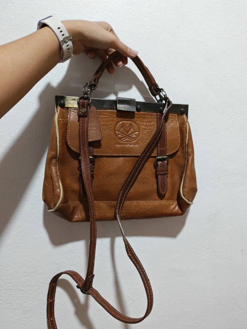 Manfield Vintage Bag (Category: Luxury Bags & Wallets) located in Quezon City. Submitted by theclutteredapt. (Listing ID 1456471872, Image 3). Description: Manfield Vintage Bag - Missing screws in design - Leather worn out - Scratches.