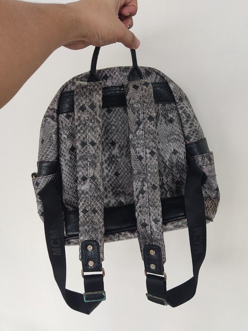 MCM Studded Snakeskin Backpack (Category: Luxury Bags & Wallets) located in Pasig City. Submitted by vintage.thrifttph (Listing ID 1456513130, Image 2). Description: dm if interested thanks, more items on profile to check. Pickup: 📌 Kapasigan, Pasig Shipping via: 🚛 Lalamove / JNT.