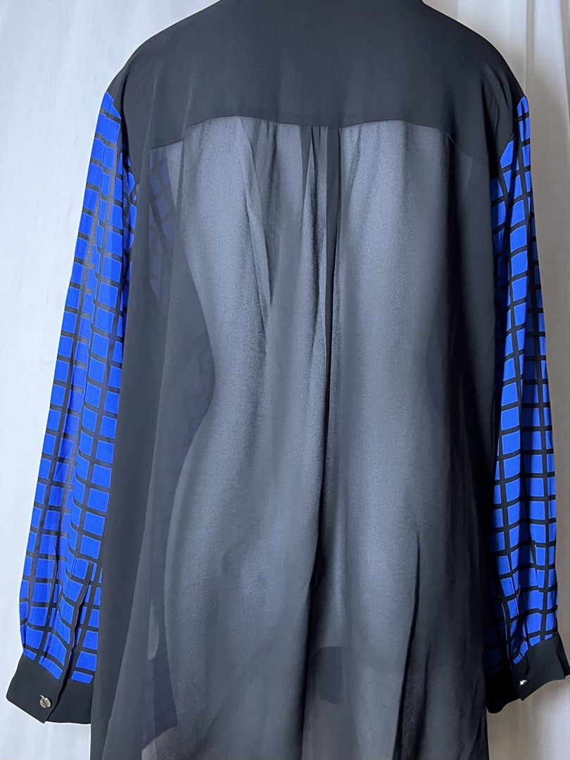 Michael Kors 2X Blue and Black Button-Up Shirt (Category: Blouses) located in Bulacan. Submitted by stacksonracks_ph (Listing ID 1456446277, Image 3). Description: - Michael Kors button-up shirt - All-over black and blue geometric print - Two chest pockets - Perfect for dressing up or down.