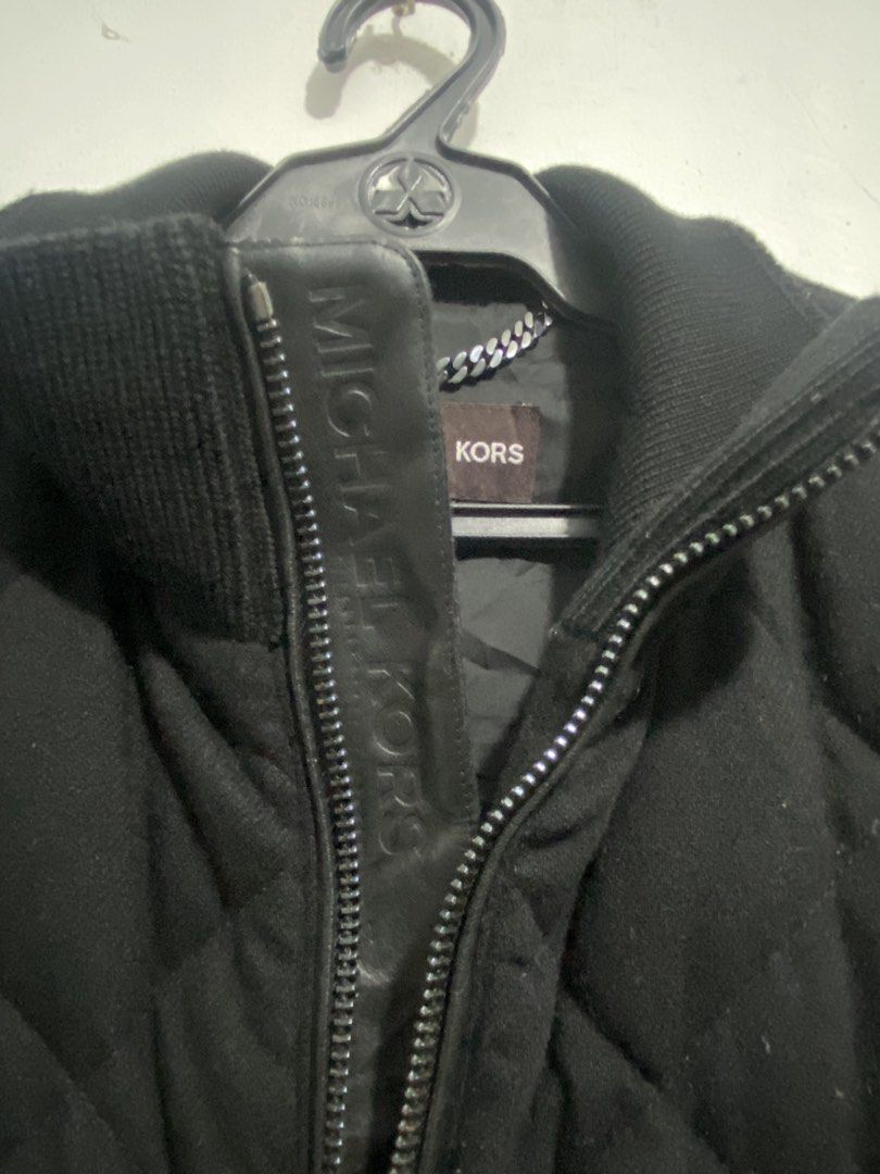 Michael Kors Vest (Category: Vests) located in Mabalacat. Submitted by dagz_thrift (Listing ID 1456461950, Image 3). Description: -Fabric Wool & Leather -Dimes 23 x 29 -Color rate 9.5-10 -No issue -Complete Tags -Need clean the vest have fur lints check last 2 pictures.