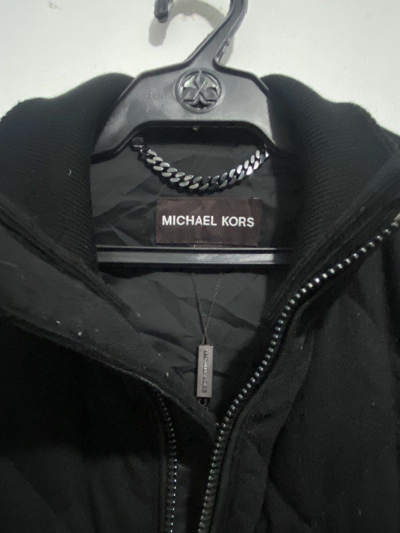 Michael Kors Vest (Category: Vests) located in Mabalacat. Submitted by dagz_thrift (Listing ID 1456461950, Image 2). Description: -Fabric Wool & Leather -Dimes 23 x 29 -Color rate 9.5-10 -No issue -Complete Tags -Need clean the vest have fur lints check last 2 pictures.