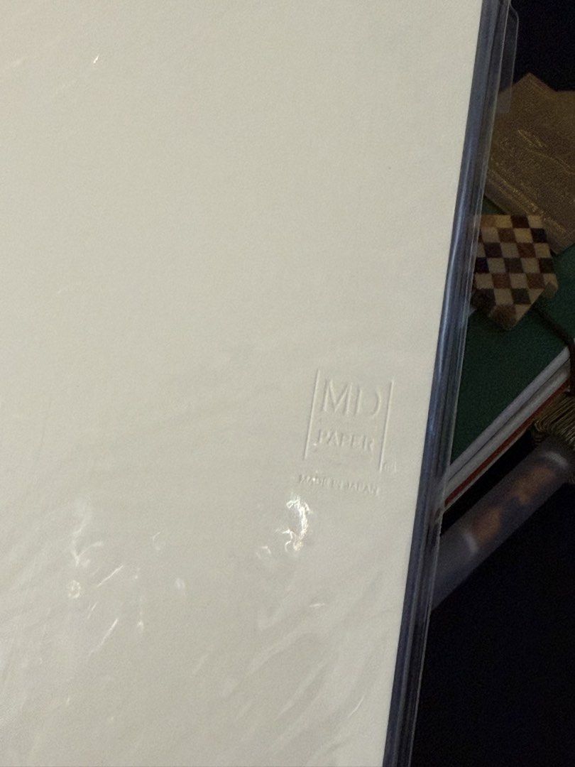 MIDORI MD Notebook B6 Slim Grid 176 Pages (Category: Stationery & School Supplies) located in Davao. Submitted by billytings (Listing ID 1456580084, Image 2). Description: Brand: MIDORI Layout: Grid - light blue 5mm grid with 5/10 square guide markings BRAND NEW; WITH PLASTIC COVER‼️ BOUGHT FROM 🇯🇵 LAST DEC 2025 Features: -Cream colored MD paper 80g/m2 -176 pages in a slim and portable Shinsho format - Thread Sewn binding for a 180degree flat o