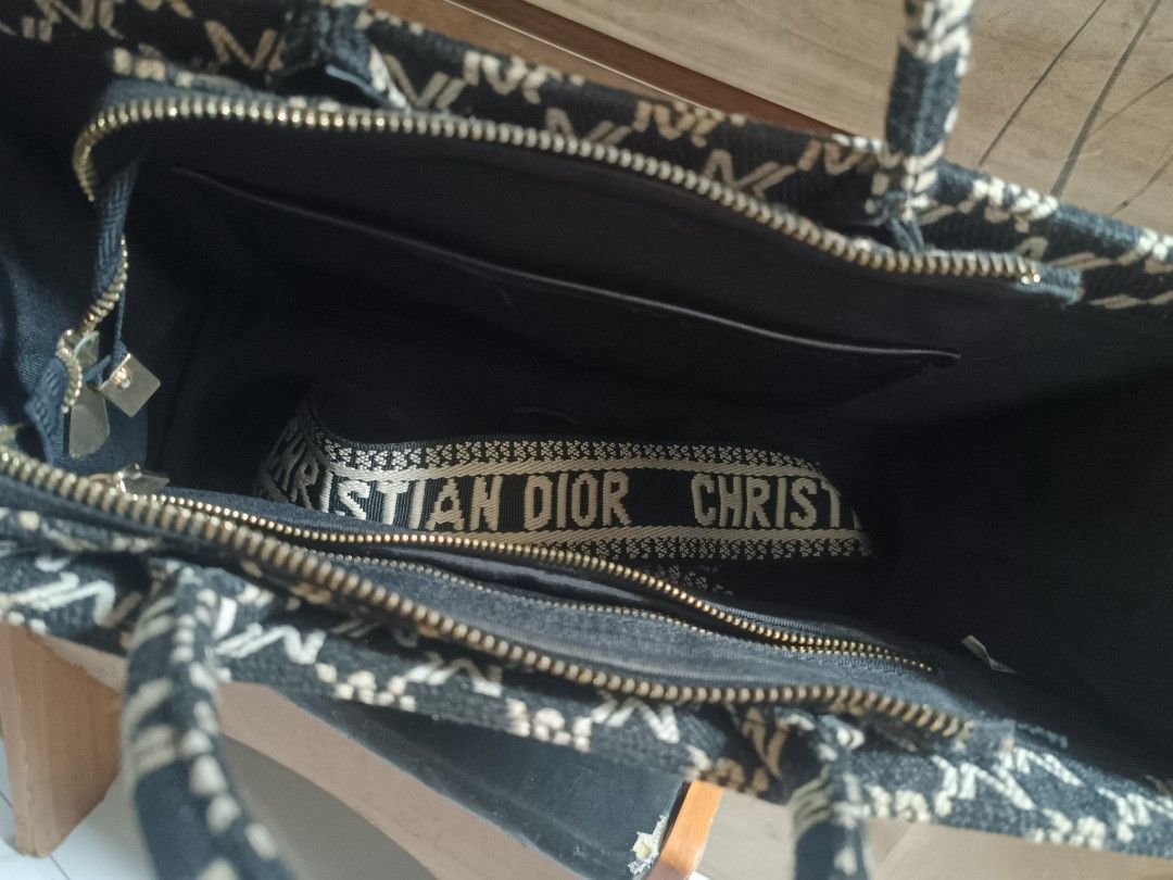MIOCRA KOLY Tote Bag with CHRISTIAN DIOR Strap (Category: Luxury Bags & Wallets) located in Cebu City. Submitted by elen30abalo (Listing ID 1456425749, Image 2). Description: - Stylish black and white patterned tote bag - 'MIOCRA KOLY' text detail on the exterior - Interior strap with 'CHRISTIAN DIOR' text - Secure zipper closure - Ample space for everyday essentials - Ideal for daily use.