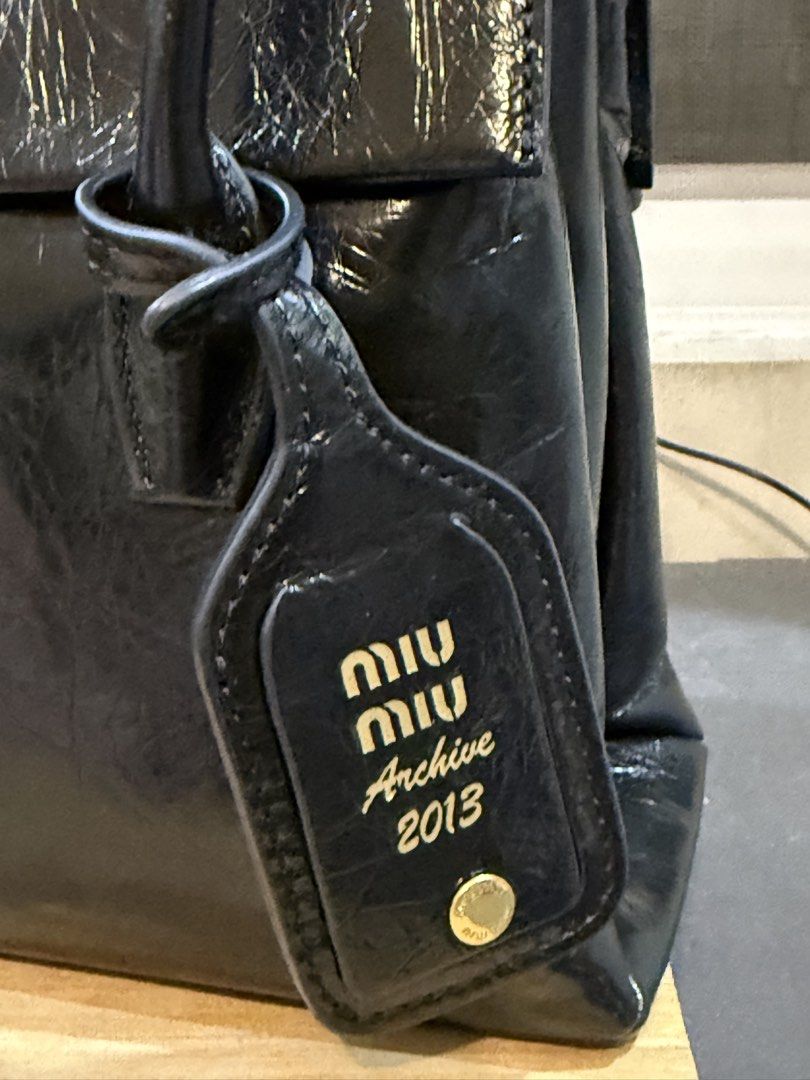 Sale! Miu Miu Solitaire Bag (Category: Luxury Bags & Wallets) located in Quezon City. Submitted by markandrewson1123 (Listing ID 1456575312, Image 2). Description: With shoulder strap (unused) NGA Used twice. .