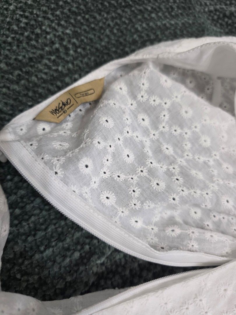 Mossimo White Eyelet Cropped Top (Category: Blouses) located in Bulacan. Submitted by declutterwithme4 (Listing ID 1456557878, Image 3). Description: - White cropped top - All-over eyelet details - Short puff sleeves - Issue: With small dot yellow stain in the sleeve.