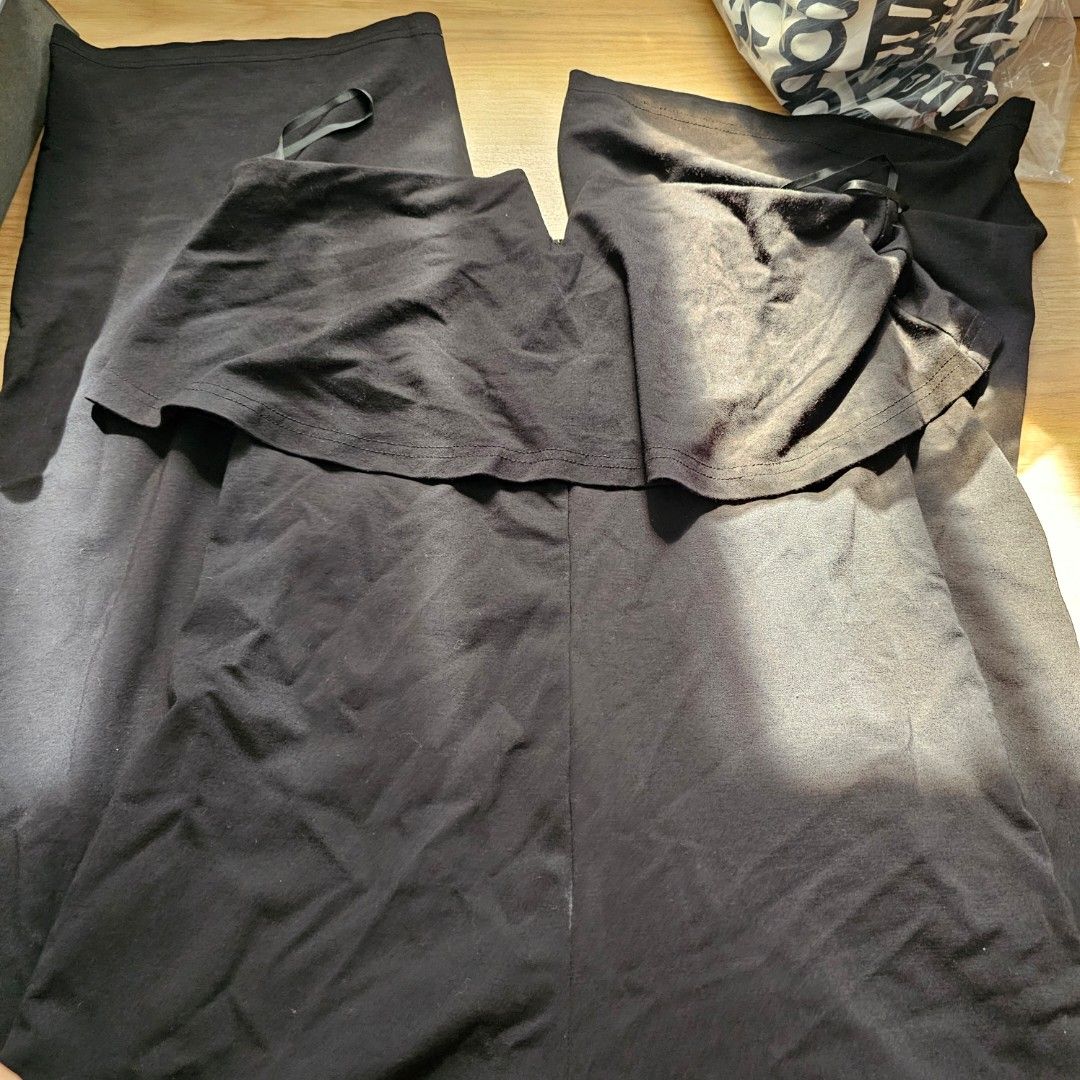 MOTF Premium Viscose V-Bar Jumpsuit Black (Category: Jumpsuits) located in Cavite. Submitted by frombellas (Listing ID 1456579185, Image 3). Description: - Brand: MOTF - Style: Black strapless jumpsuit - Features: V-bar neckline with ruffled overlay, wide leg pants - Material: Premium viscose - Occasion: Ideal for parties or formal events.