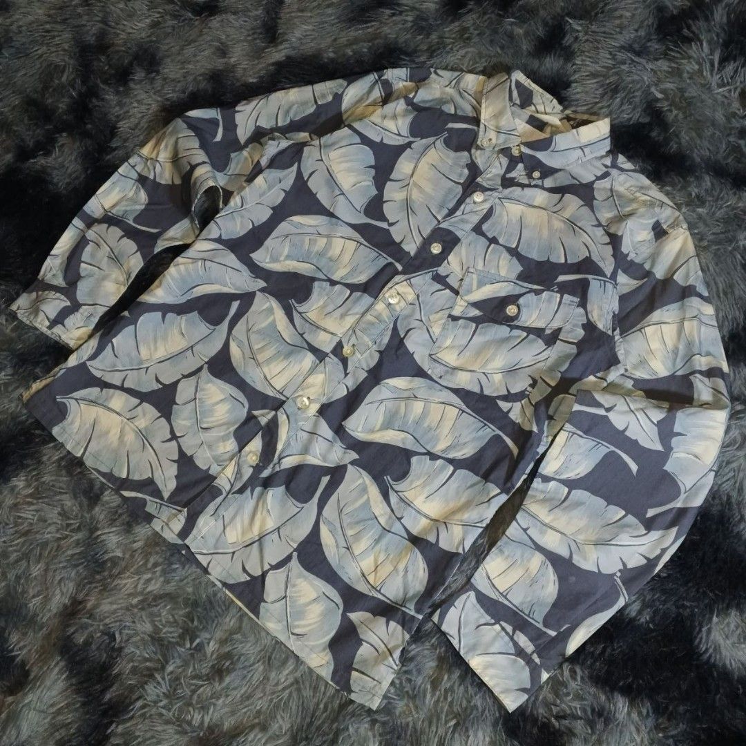 Nanamica button-down tropical/wind print tailored shirt (Category: Activewear) located in Dagupan City. Submitted by finestthriftstuffph (Listing ID 1456491033, Image 3). Description: Authentic Very Presentable Size: S on Tag Can Fit M to Semi L (Measured by INCHES) Width: 21.5 Length: 27 Shoulder: 17 Sleeve: 24 Condition: Very Good Color Rate: 9.5/10 Issue: None "Colors may vary due to lightning" "Swipe each photo to see more details.