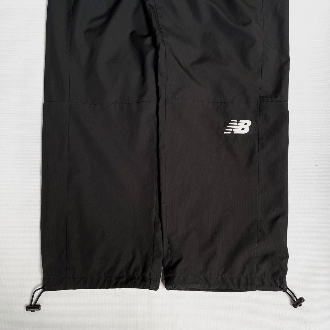 New Balance Black Track Pants (Category: Joggers) located in Mandaue City. Submitted by chinsyap_03 (Listing ID 1456501936, Image 3). Description: - Black New Balance track pants - Elastic waistband with drawstring - Adjustable drawstring at leg opening - Two side pockets - Perfect for workouts or casual wear.