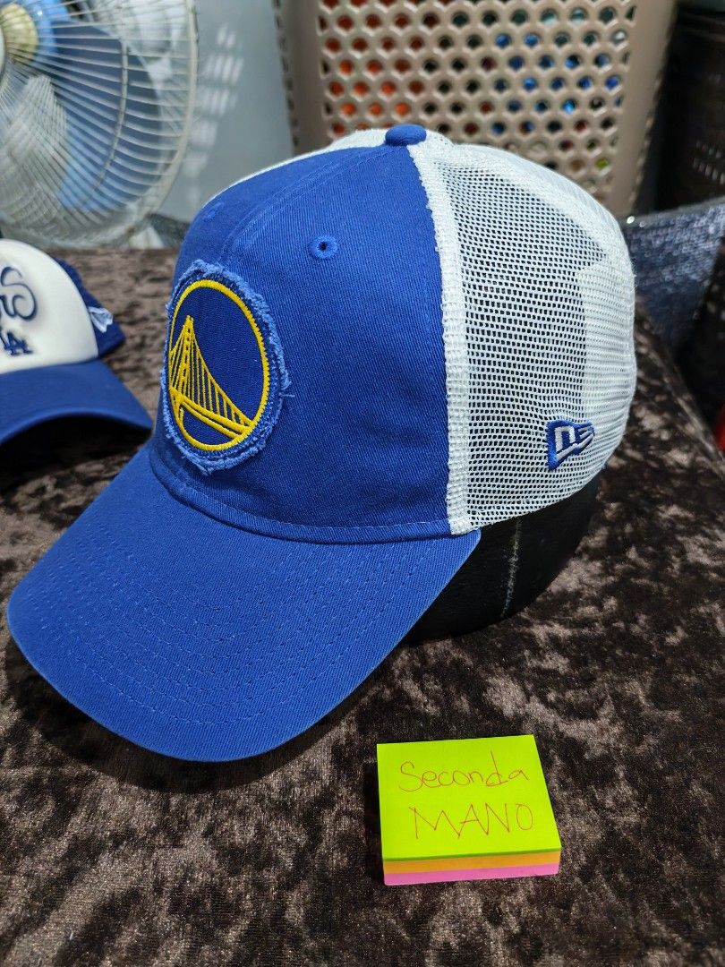 New Era Golden State Warriors Trucker Cap (Category: Caps & Hats) located in Cainta. Submitted by yiegel (Listing ID 1456546583, Image 2). Description: - Blue and white Golden State Warriors trucker cap - Features official team logo on front - New Era 9FORTY model - Adjustable snapback for a comfortable fit - Ideal for any Warriors fan.