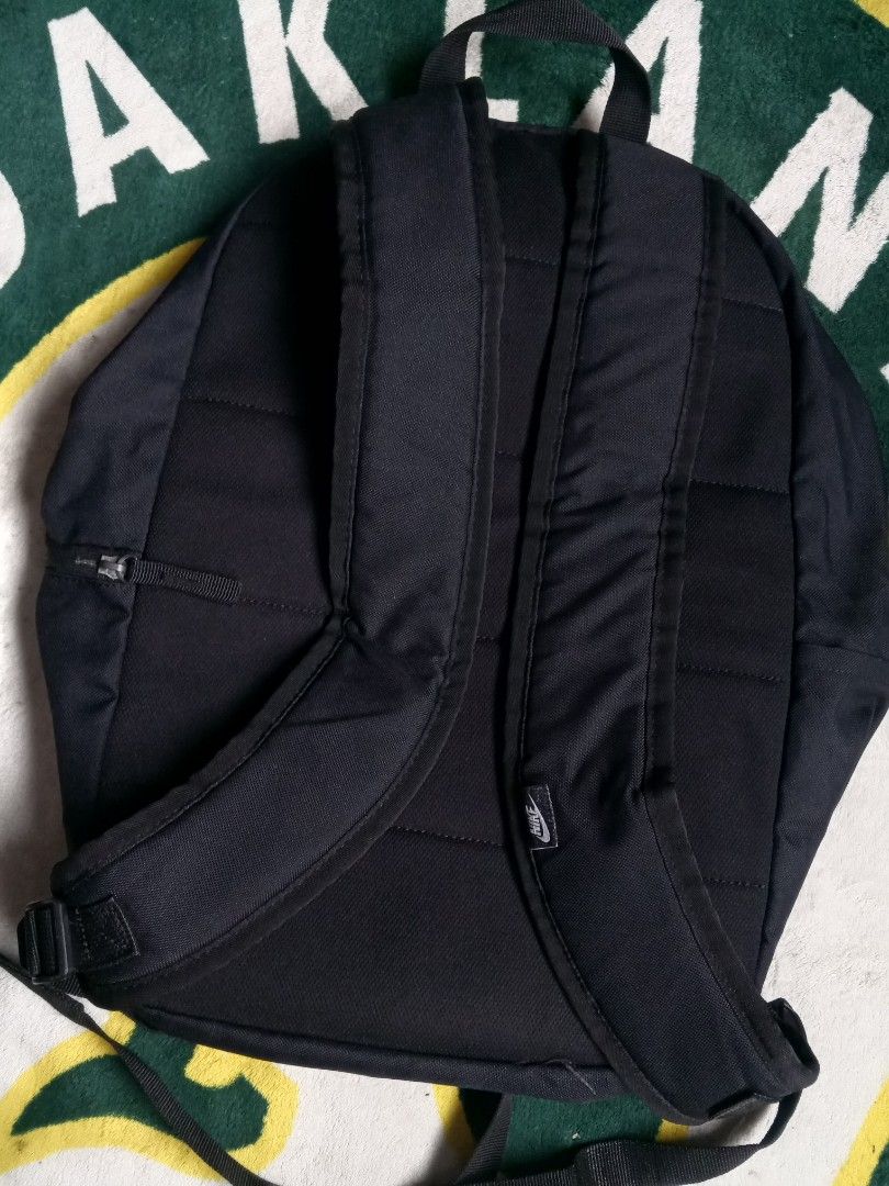 Nike Black Backpack (Category: Backpacks) located in Las Pinas. Submitted by allhandpick (Listing ID 1456534932, Image 3). Description: - Classic black Nike backpack - Simple and functional design - Main compartment with a front pocket - Padded shoulder straps for comfort - Made from 100% polyester - Ideal for school or everyday use.
