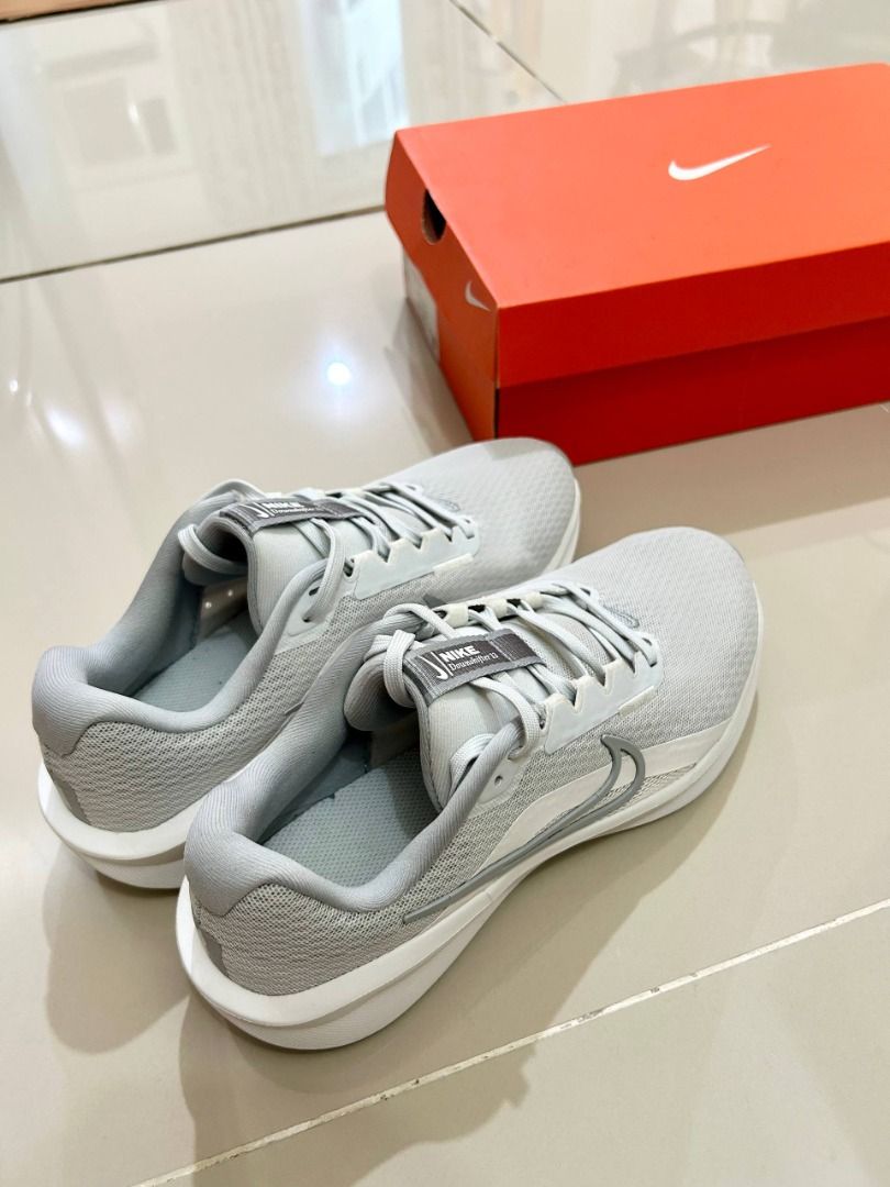 Nike Downshifter 13 Photon Dust / Light Smoke Grey (Category: Sneakers) located in Manila. Submitted by softlysorted (Listing ID 1456501834, Image 3). Description: Authentic Nike Downshifter 13 road-running shoes in Photon Dust/Light Smoke Grey. Lightweight and versatile for running, walking, workouts, or everyday wear. Only used once for an indoor running class. I forgot to bring my running shoes and had to buy a pair from a nearby store (retail