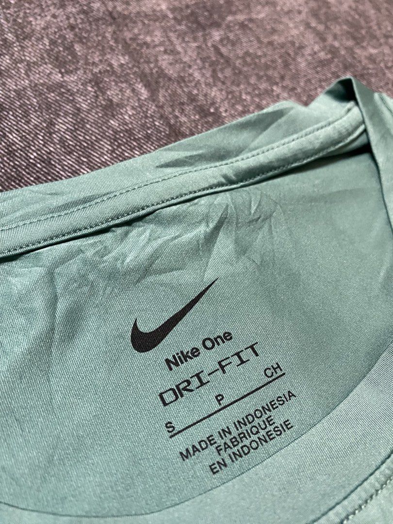 Nike Dri-FIT T-Shirt Teal (Category: Activewear) located in Cebu City. Submitted by theloose.thread (Listing ID 1456545249, Image 2). Description: - Lightweight Nike Dri-FIT t-shirt - Nice teal color - Ideal for workouts or casual wear - Breathable fabric to keep you cool - Small Nike logo on the chest.