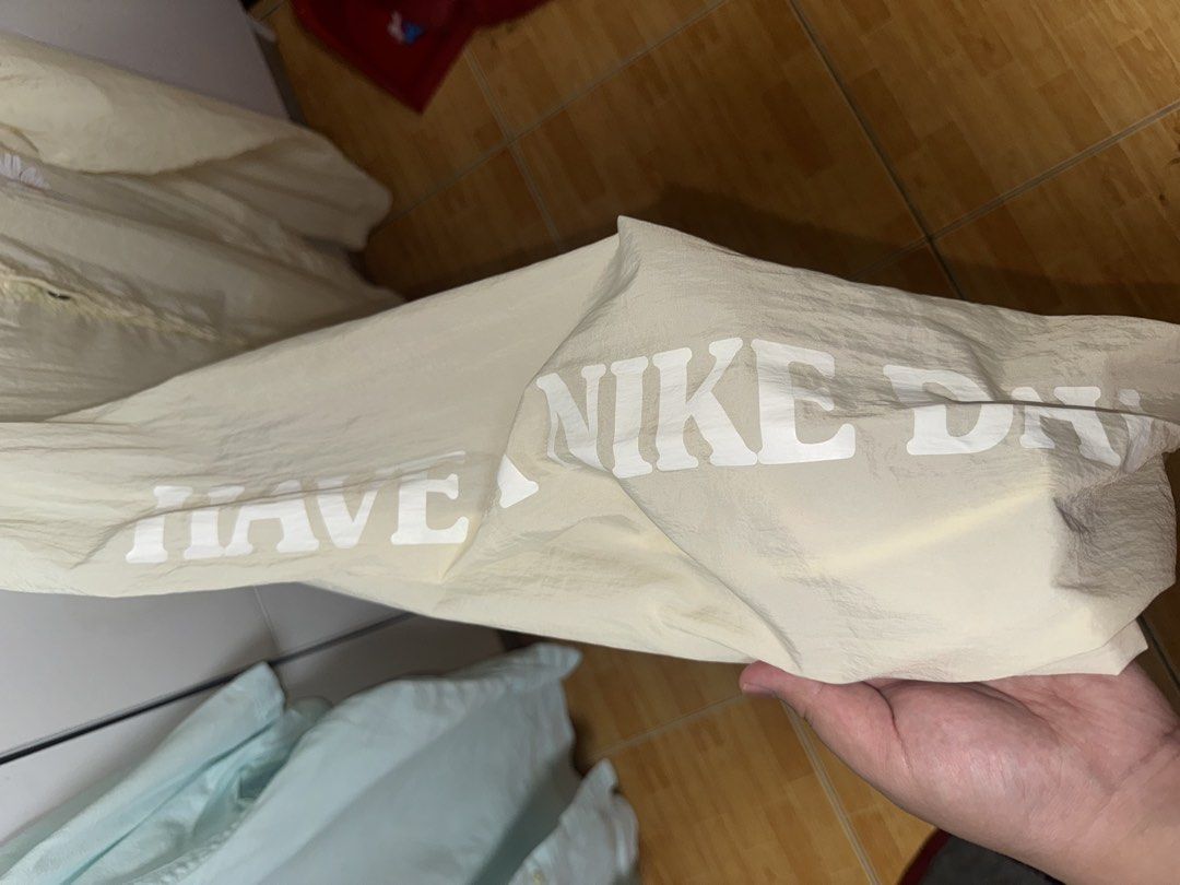 Nike Embroidered Daisy Coach Jacket in Coconut (Category: Coats, Jackets and Outerwear) located in Manila. Submitted by quintessesommerset (Listing ID 1456595552, Image 3). Description: .