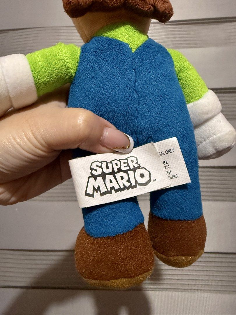 Nintendo Super Mario Luigi medium plush (Category: Plushies & Soft Toys) located in Manila. Submitted by bcbg3217 (Listing ID 1456438387, Image 3). Description: ‼️PLEASE READ BEFORE BUYING‼️ Like new condition with etiketa Authenticity guaranteed No other inclusions Actual photos are posted No issues or flaws unless stated Please check the photos thoroughly before placing an order JnT regular or Lalamove COD for Metro Manila ⚠️BUY AT YOUR OWN RIS