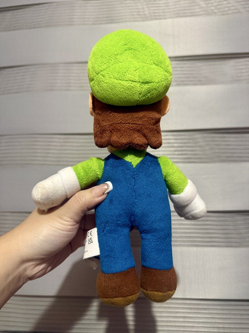 Nintendo Super Mario Luigi medium plush (Category: Plushies & Soft Toys) located in Manila. Submitted by bcbg3217 (Listing ID 1456438387, Image 2). Description: ‼️PLEASE READ BEFORE BUYING‼️ Like new condition with etiketa Authenticity guaranteed No other inclusions Actual photos are posted No issues or flaws unless stated Please check the photos thoroughly before placing an order JnT regular or Lalamove COD for Metro Manila ⚠️BUY AT YOUR OWN RIS