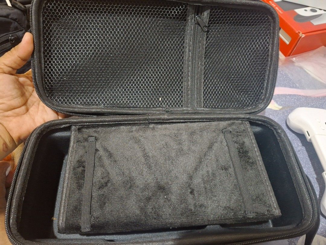 Nintendo Switch Monster Hunter Rise Sunbreak Carrying Case & Game (Category: Nintendo) located in Manila. Submitted by maarte0631 (Listing ID 1456457635, Image 3). Description: TAKE ALL - Official Monster Hunter Rise Sunbreak Nintendo Switch Carrying Case - Features a cool Sunbreak design - Soft interior lining protects your console - Convenient mesh pocket for accessories - Includes the Monster Hunter Rise Sunbreak game for Nintendo Switch - Ide
