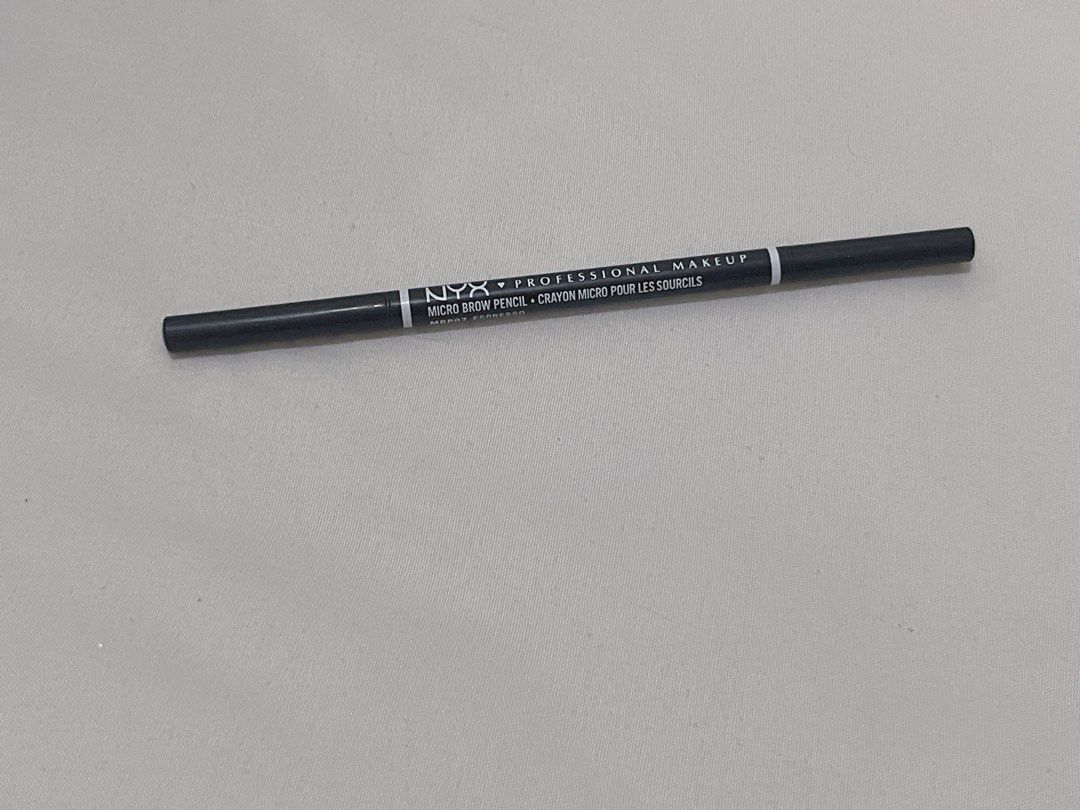 NYX Professional Makeup Micro Brow Pencil - Espresso (Category: Makeup) located in Del Monte. Submitted by pageturner_digital (Listing ID 1456536061, Image 1). Description: - NYX Micro Brow Pencil - Shade: Espresso - Perfect for defining brows - Fine tip for precise application - Creates a natural look - Ideal for everyday makeup.