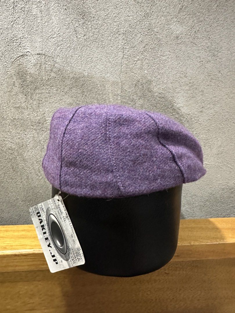 Oakley Purple Tweed Flat Cap Hat (Category: Caps & Hats) located in Mabalacat. Submitted by mrniceguy421 (Listing ID 1456591202, Image 2). Description: - Brand: Oakley - Style: Purple tweed flat cap - Features: Embroidered Oakley logo on the side - Condition: Brand new with original tags attached - Perfect for: Casual wear, adding a stylish accessory to your outfit.