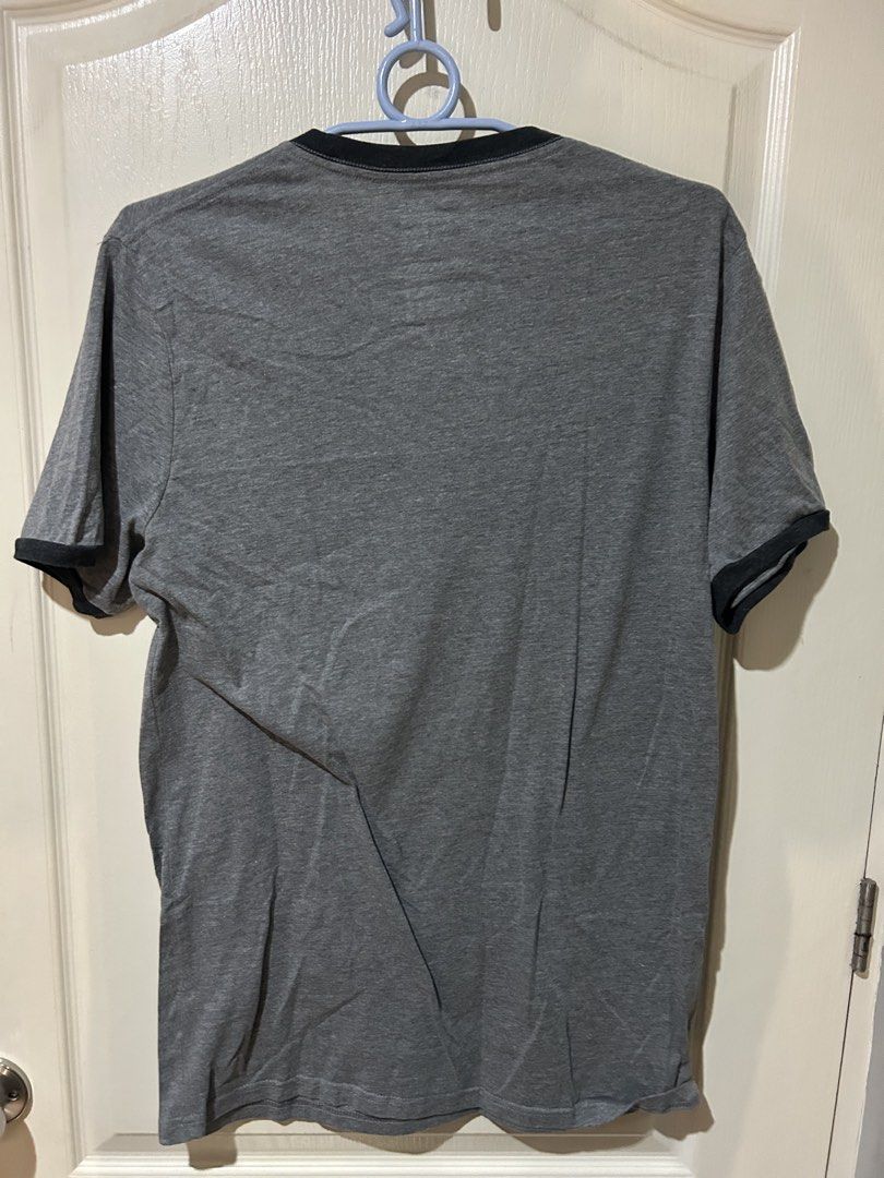 Old Navy Classic Ringer Crew T-Shirt Grey M (Category: Tshirts & Polo Shirts ) located in Manila. Submitted by dal527 (Listing ID 1456589350, Image 3). Description: - Grey ringer t-shirt from Old Navy - Classic crew neck with black trim on collar and sleeves - Made in Bangladesh - Size: Medium (M) - Ideal for casual everyday wear.