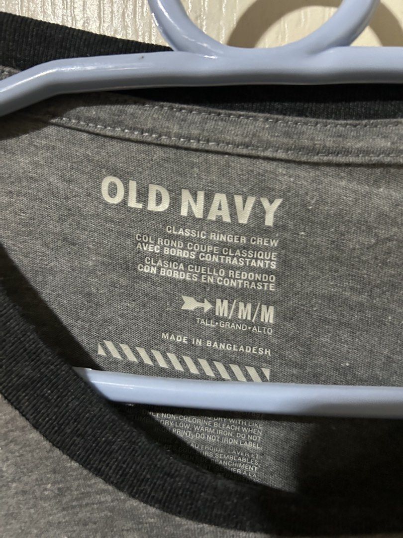 Old Navy Classic Ringer Crew T-Shirt Grey M (Category: Tshirts & Polo Shirts ) located in Manila. Submitted by dal527 (Listing ID 1456589350, Image 2). Description: - Grey ringer t-shirt from Old Navy - Classic crew neck with black trim on collar and sleeves - Made in Bangladesh - Size: Medium (M) - Ideal for casual everyday wear.