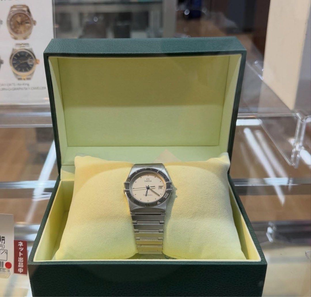 Omega Constellation Manhattan (Category: Luxury Watches) located in Obando. Submitted by gegecollan01013 (Listing ID 1456595958, Image 1). Description: - Classic Omega Constellation watch - Stainless steel band - Cream dial with Roman numeral hour markers - Date window at 3 o'clock - Comes with original box Item is in Japan need dp eta Sep 8 , 2026.