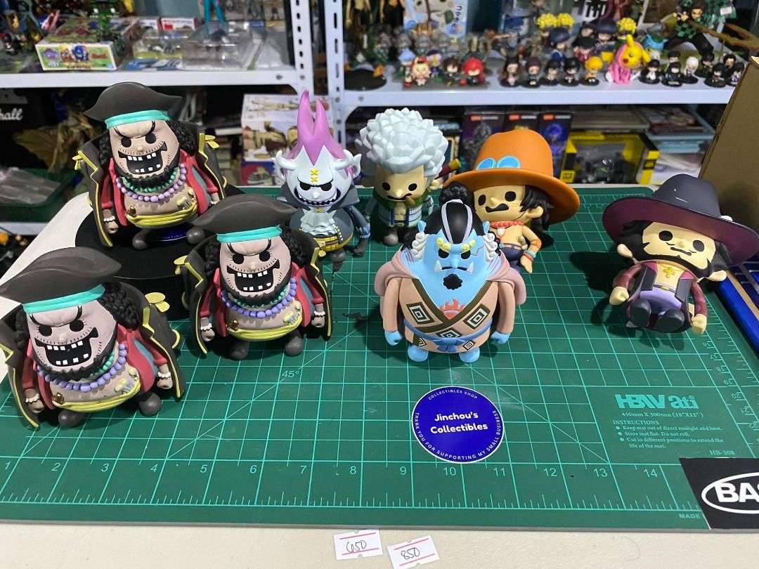 One Piece Chibi Figures - Blackbeard, Jinbe, Ace, Brook (Category: Figurines & Statues) located in Caloocan City. Submitted by rickki_t (Listing ID 1456512491, Image 1). Description: - Set of One Piece Chibi Figures - Includes multiple Blackbeard figures - Also includes Jinbe, Ace, and Brook figures - Ideal for any One Piece fan's collection - Figures displayed on a cutting mat (for reference) - Please note: Some figures may have slight variation