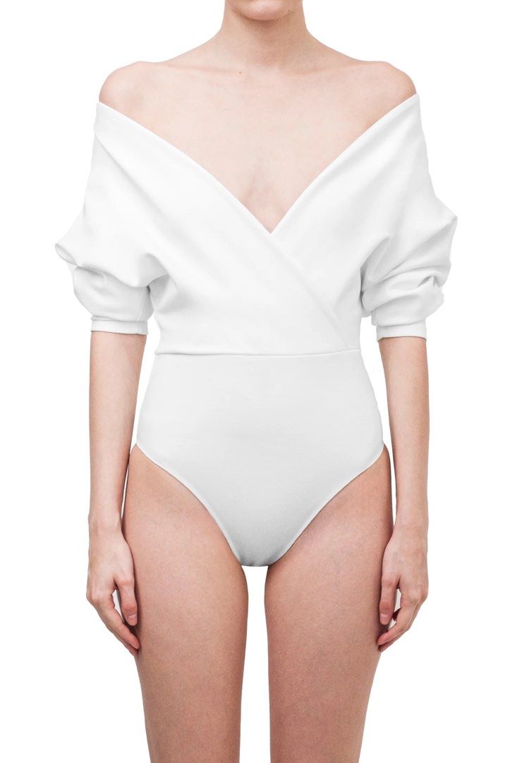 Patty Ang Patton White Bodysuit (Category: Others Tops) located in Cebu City. Submitted by declutterwithmecebu (Listing ID 1456588827, Image 1). Description: super great quality as in !!.