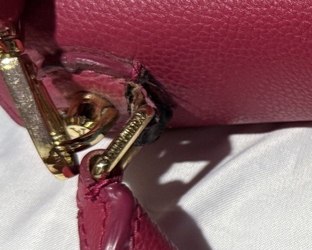 Pink Handbag with Gold Hardware (Category: Luxury Bags & Wallets) located in Manila. Submitted by devorahlop39116 (Listing ID 1436298450, Image 2). Description: - Pink handbag - Gold-tone logo - Top handle - Detachable shoulder strap - Leather material - Flap closure Sign of usage sa handle only.