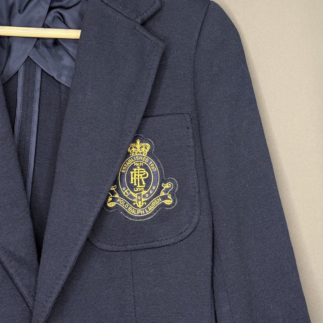 Polo Ralph Lauren Crest-Embellished Blazer (Category: Coats, Jackets and Outerwear) located in Manila. Submitted by saintjohnn (Listing ID 1456570945, Image 3). Description: Polo Ralph Lauren Crest-Embellished Blazer Excellent Condition No Issue Authentic Size: 6 (small) Length: 27" Width: 17" Sleeve: 27" ₱5,000.