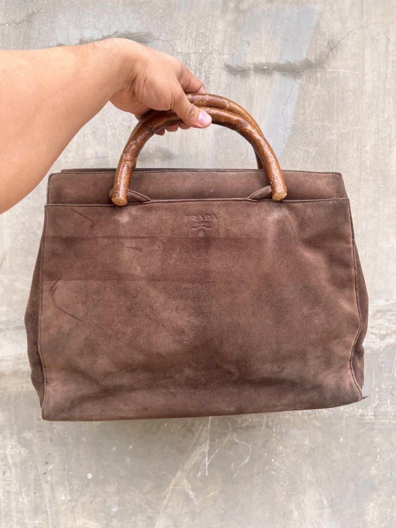 Prada Vintage Suede Wood Handbag (Category: Luxury Bags & Wallets) located in Caloocan City. Submitted by thon0806 (Listing ID 1456447433, Image 1). Description: bag is in good condition need lang ipa bag spa slouchy din suede nya kaya nagsak tignan.