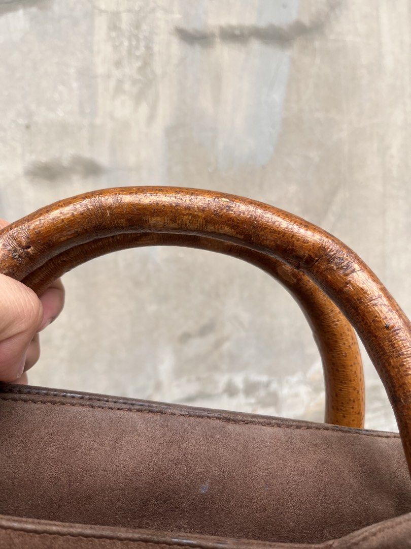 Prada Vintage Suede Wood Handbag (Category: Luxury Bags & Wallets) located in Caloocan City. Submitted by thon0806 (Listing ID 1456447433, Image 3). Description: bag is in good condition need lang ipa bag spa slouchy din suede nya kaya nagsak tignan.